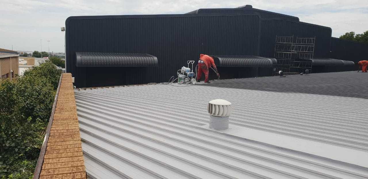Metal roof sprayed and waterproofed